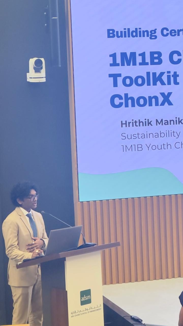 Hrithik Manikandan presenting the 1M1B Climate Action Toolkit and ChonX at Abu Dhabi School of Management